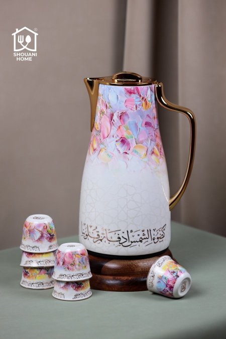 دلة قهوة اوف وايت موردة زهري اطار ذهبي كتابة { كَضَوْءِ الشَّمْسِ أَدْفَأْتُمْ قُلُوبَنا }