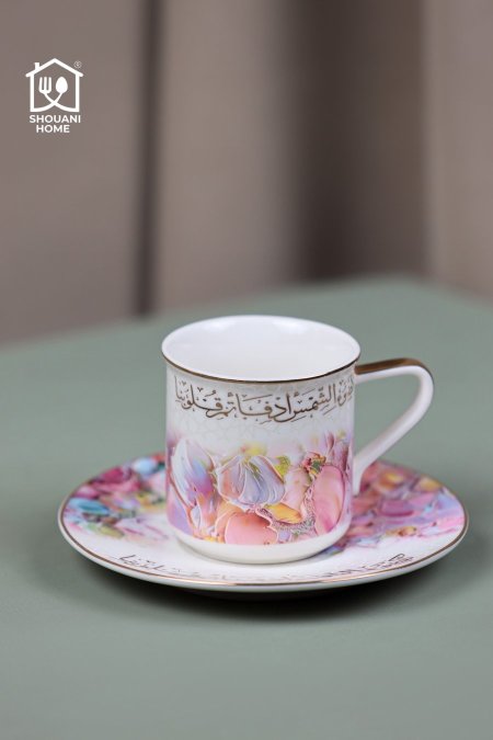 طقم 6 فناجين شاي مع 6 صحون اوف وايت موردة زهري اطار ذهبي مع كتابة { كَضَوْءِ الشَّمْسِ أَدْفَأْتُمْ قُلُوبَنا }