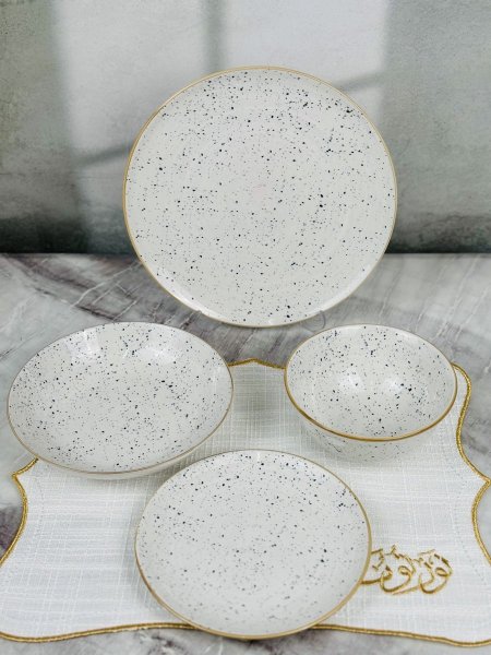 طقم صحون بورسلان منقط 24 قطعة