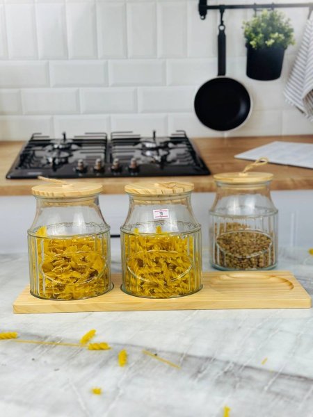 طقم مرتبانات زجاج اسطواني مع غطاء خشب وقاعدة بامبو