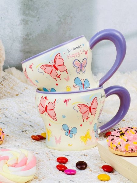 مج بورسلان مع يد كبيرة مرسم فراشات